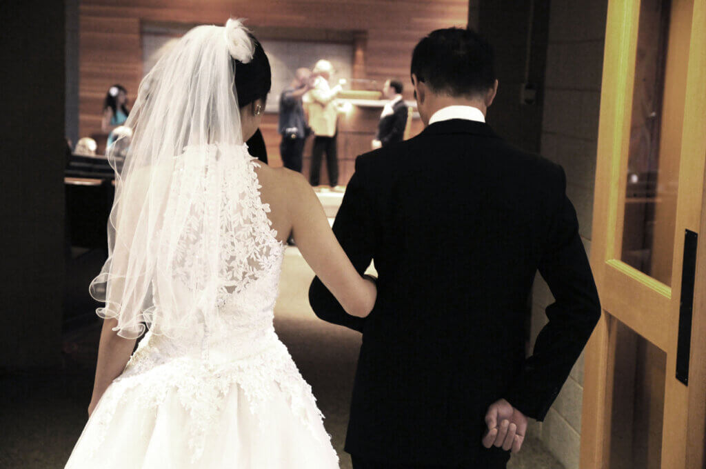 a bride and groom in the church