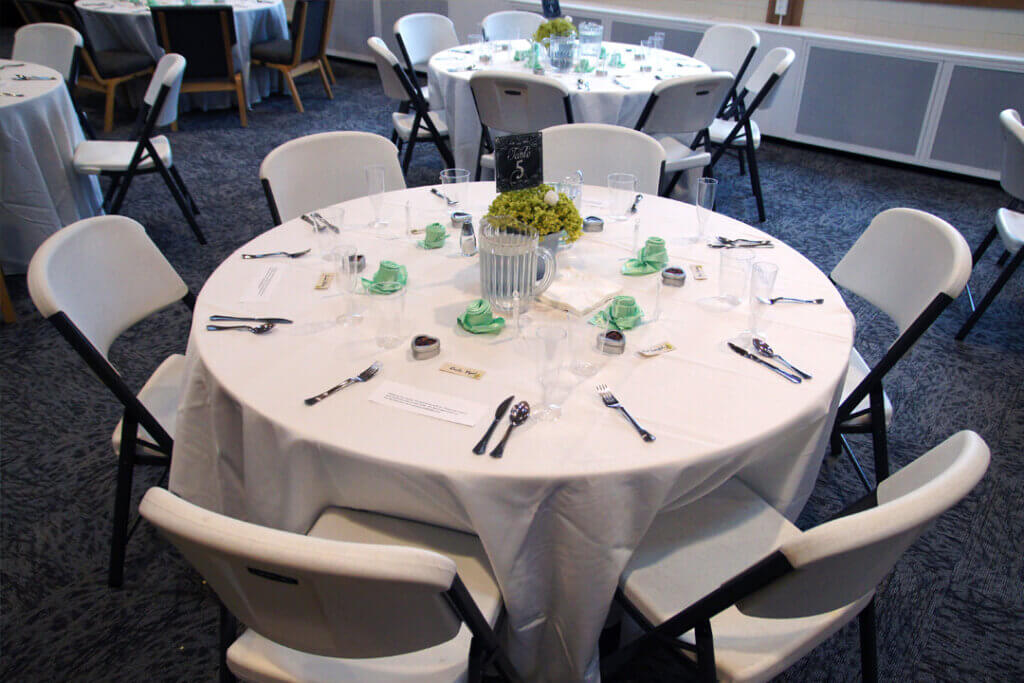 the wedding reception table setting