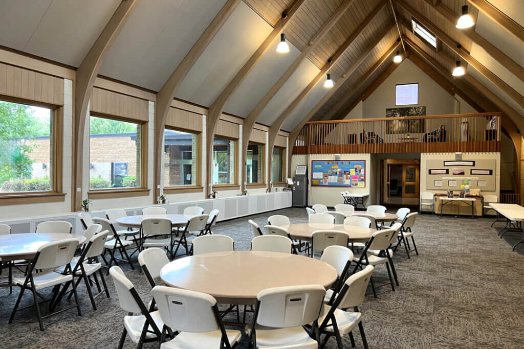the Social Hall with tables and chairs