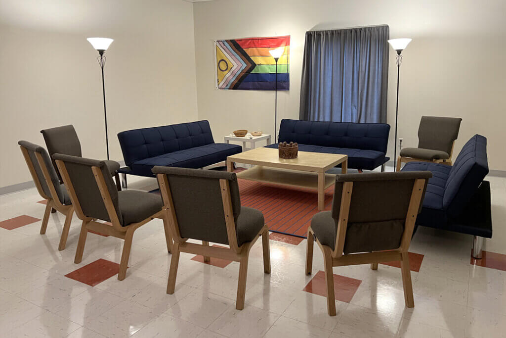 the Whitney Young room with a table and seating