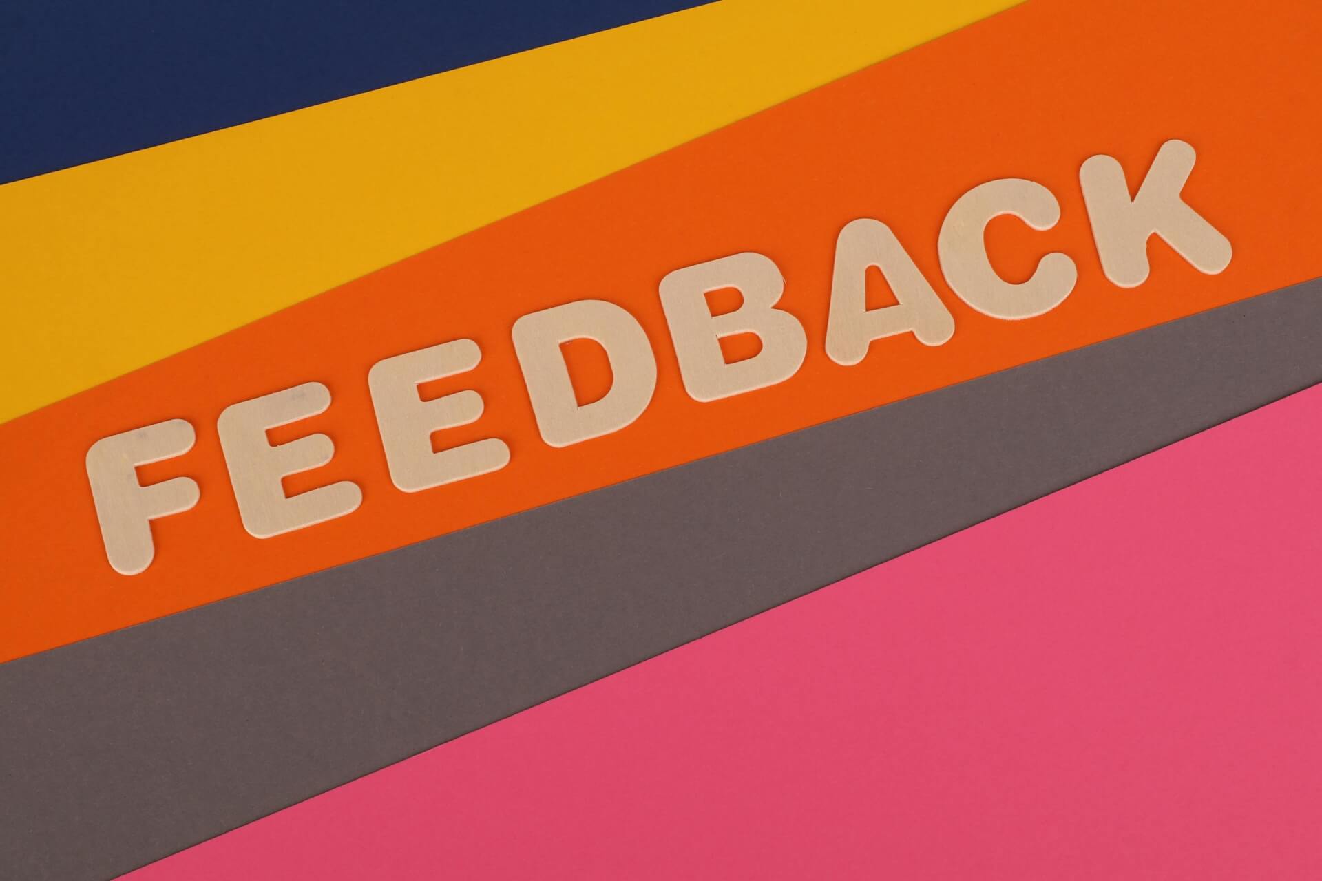Bright composition with the word 'Feedback' on colorful backgrounds, ideal for graphical use.
